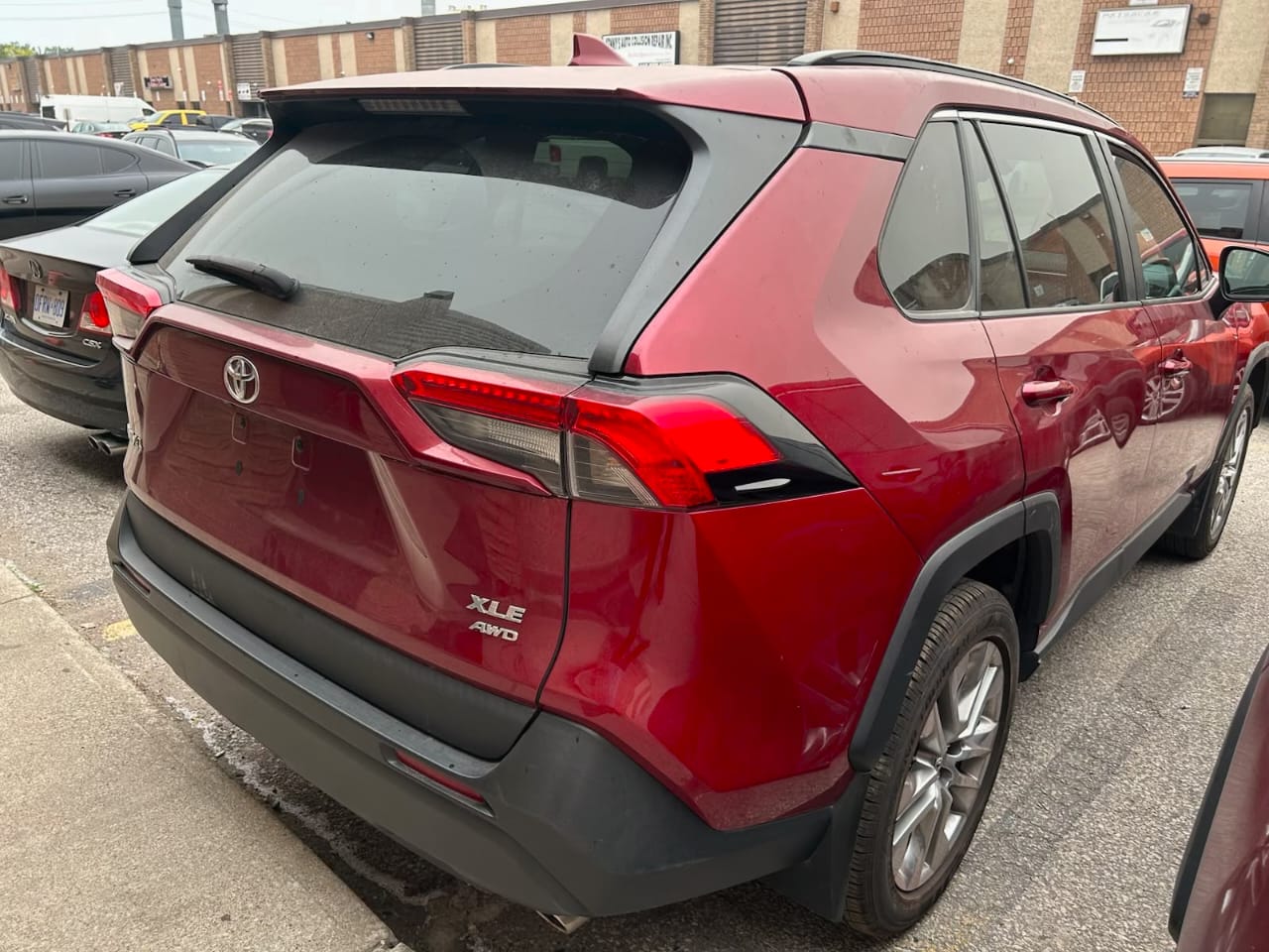 Red 2024 Toyota RAV4 front detail